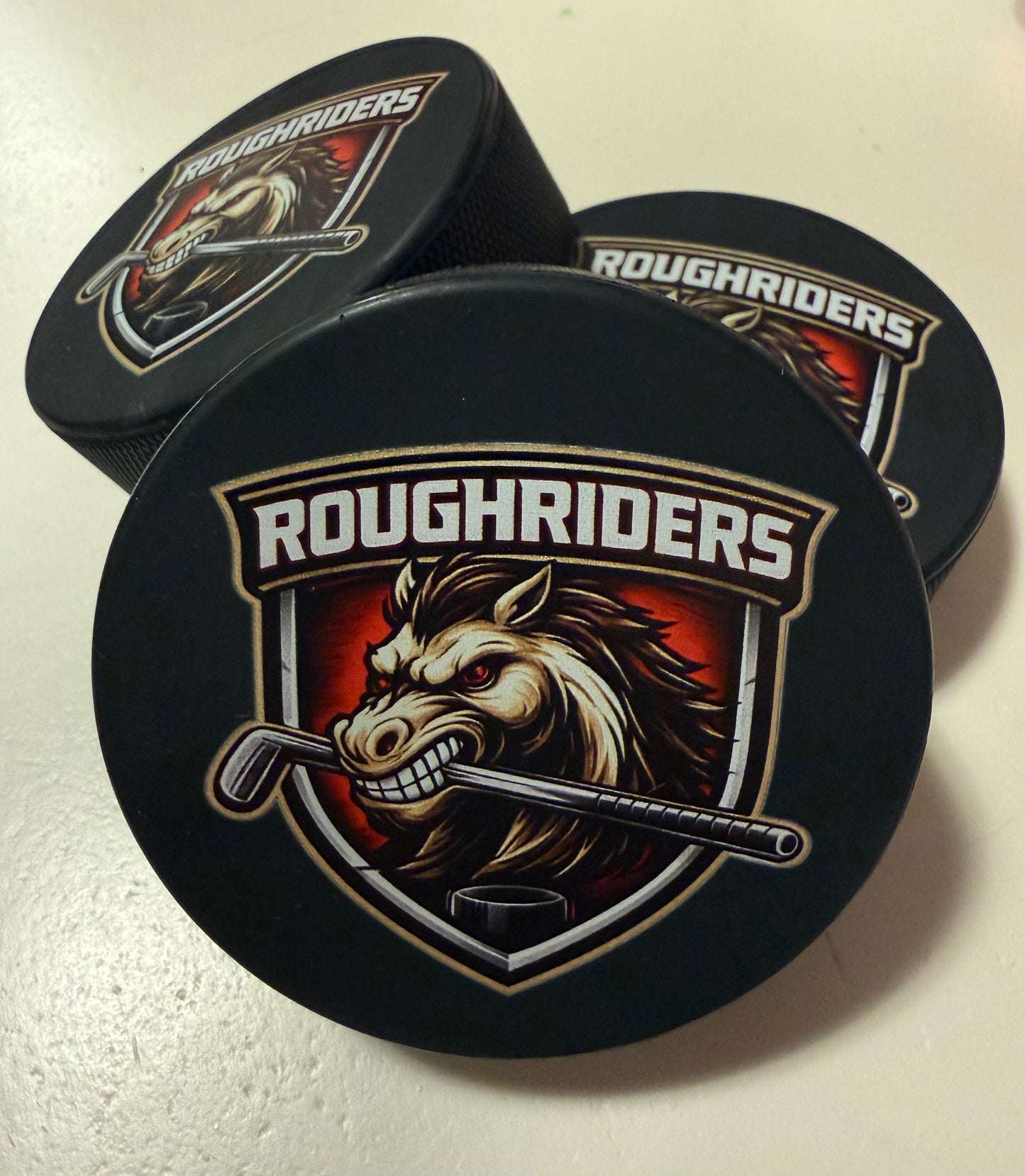 Roughriders Logo Puck
