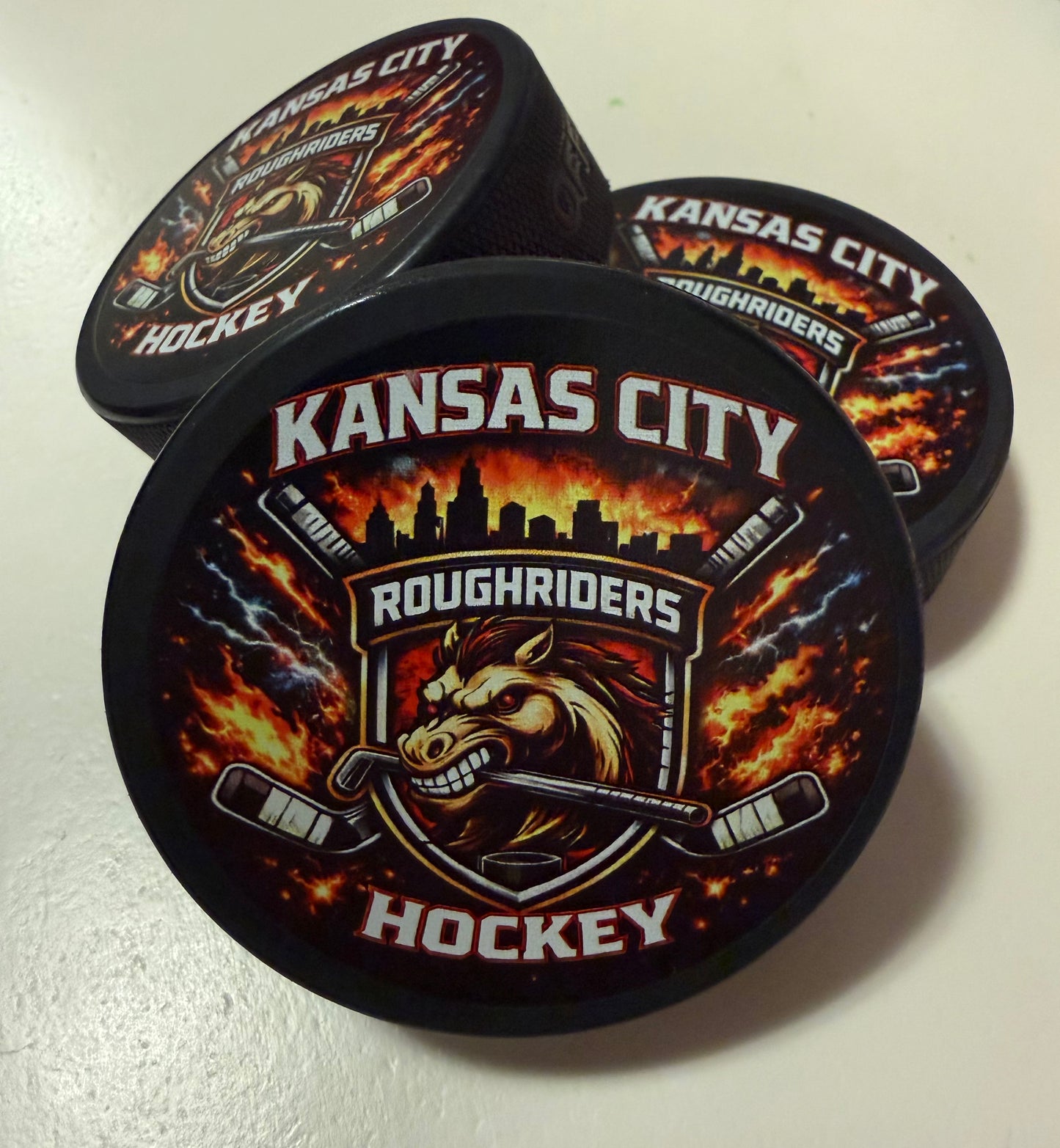 Roughriders Design Puck